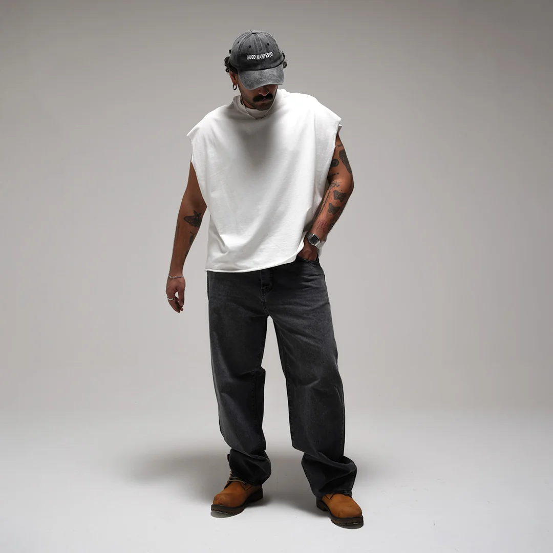 SLEEVELESS STATEMENT TEE — 7